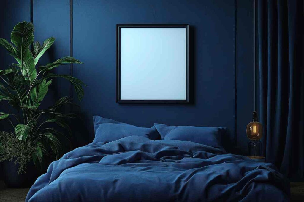 Dark blue bedroom with a blank frame mounted on the wall and blue drapery curtains near New York City