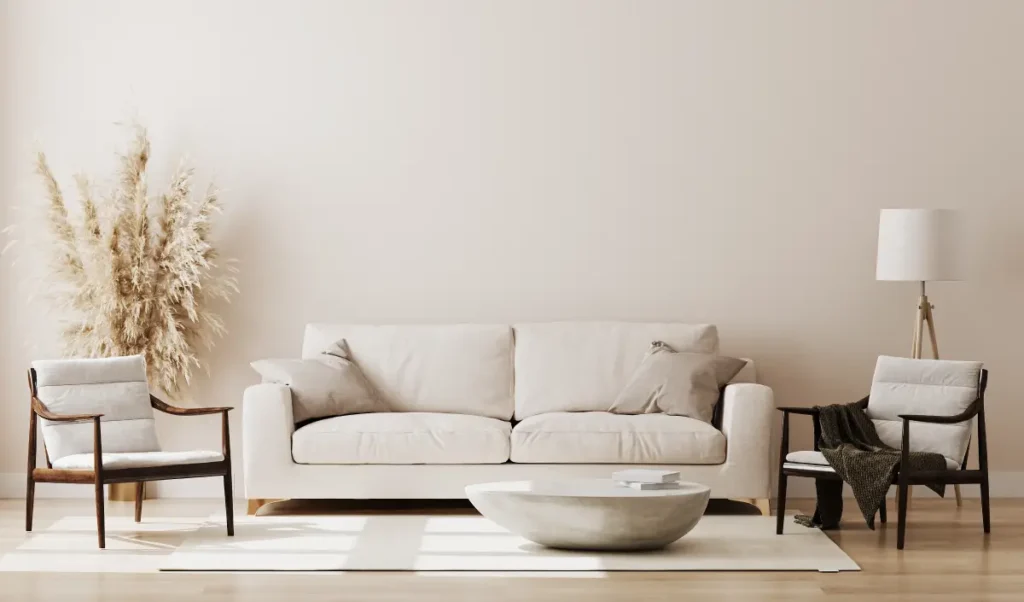 Living room beige walls with Scandinavian design, including two seats and a couch